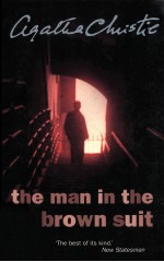 <em>THE</em> MAN IN <em>THE</em> BROWN <em>S</em>UIT